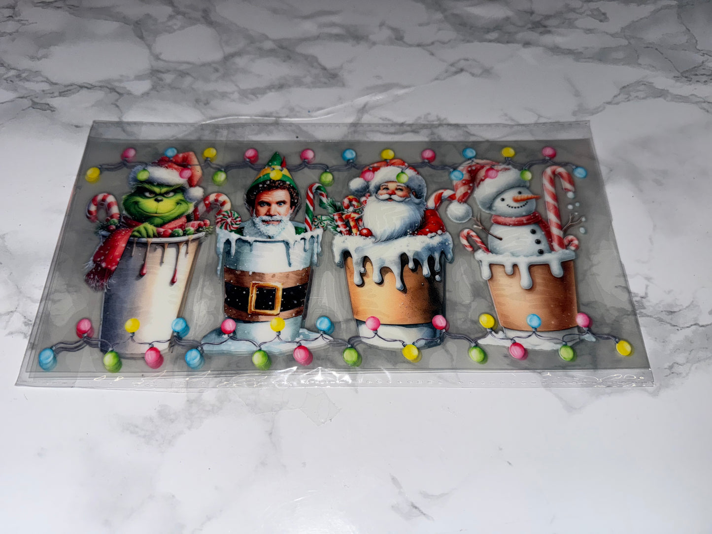 Four Christmas-themed ice cream cones