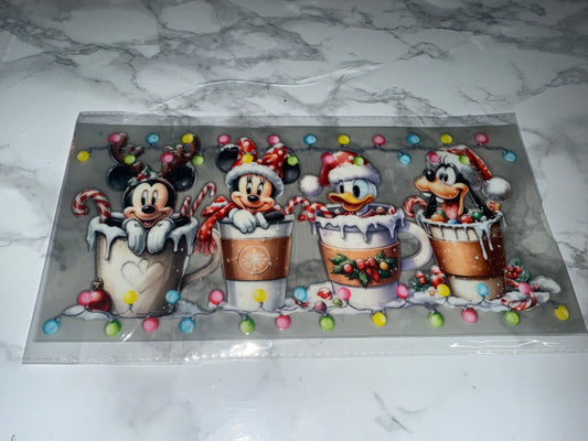 Cartoon characters in mugs with festive decorations 