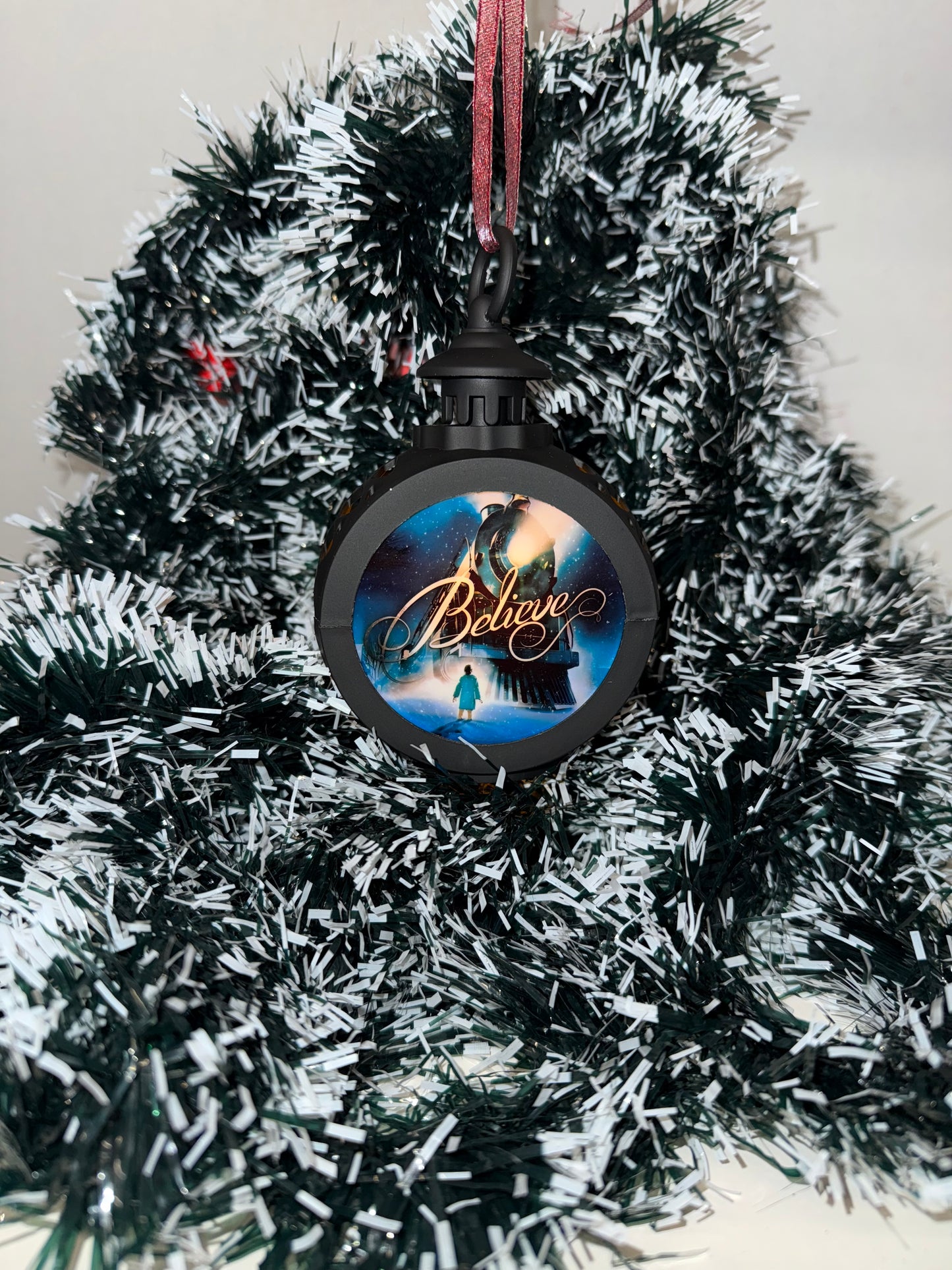 Small Xmas lantern with the Polar express, illustrated with “believe” or can be fully customisable