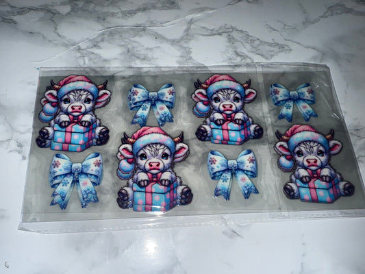 Decorative Blue UVDTF with cartoon cows and bows 